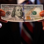 The new $100 bill featured a color-shifting image meant to foil counterfeiters.