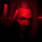 Julian Assange, photographed inside a prison van, returns to Wandsworth Prison after being granted conditional bail by the London courts.