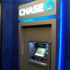 In what may be the beginning of a tough new trend, Chase ATMs (in Illinois, first) are charging non-Chase customers $5 withdrawal fees.