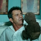 One critic says Mel Gibson delivers a "great performance" in "The Beaver," playing an unstable man who tries to get his life back together with the help of a puppet.