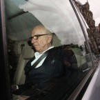 Rupert Murdoch is driven from his London apartment on July 13: The phone-hacking scandal rocking the Australian's media empire has crossed the Atlantic, in the form of an FBI investigation.