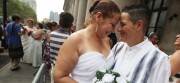 Maira Garcia (right) and Maria Vargas wait in line to get married in New York: 659 marriage licenses were reportedly issued by New York City Sunday to both gay and straight couples.