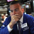 Traders work on the floor of the New York Stock Exchange Thursday, when the stock market had its worst one-day plunge in years.