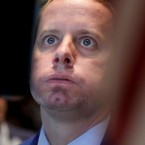 Traders work on the floor of the New York Stock Exchange: This week saw four straight days of 400-point swings on the Dow Jones Industrial Average -- the most in its history.