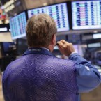 A trader on the New York Stock Exchange: Stocks are trading cheaply relative to earnings and some are saying it's time to buy.