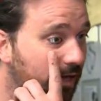 Filmmaker Rob Spence points to his right eye, which is actually a battery-operated video camera that can be taken in and out of his eye socket.