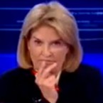 Fox News host Greta Van Susteren and Tucker Carlson were still at odds at the end of a heated seven-minute debate over Mike Tyson's extremely graphic comments about Sarah Palin.