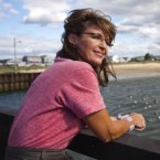 Sarah Palin implied Tuesday night that she might be better able to serve the country without the "shackles" of a presidential campaign and title.