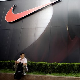 A Nike advertisement in Shanghai: Nike is trying to utilize China's growing interest in sports and physical activity and expand its more than 7,000 stores.