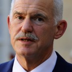 Greek Prime Minister George Papandreou roiled world markets with a plan to put the fate of a last-minute E.U. bailout package in the hands of Greek voters who overwhelmingly oppose the bailout.
