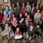 TLC's 19 Kids and Counting brood, including eldest son Josh and his wife Anna's new baby (center): Matriarch Michelle is pregnant with her 20th child.