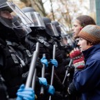 Occupiers face off with police during a Portland, Ore., demonstration: To control the crowds, some cops have used pepper spray, which can cause intense skin and eye pain.