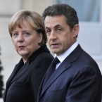 German Chancellor Angela Merkel and French President Nicolas Sarkozy presented a plan Monday that would penalize eurozone countries with out-of-control deficits.