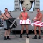 The crew aboard British Royal Navy's HMS Ocean celebrates the happy news of their early return home with a festive rendition of Mariah Carey's holiday hit.