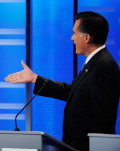 Mitt Romney extends his hand and bets Texas Gov. Rick Perry $10,000 during Saturday's debate, a potential reminder to struggling Americans that Romney is very, very wealthy.