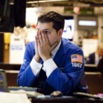Traders on the floor of the NYSE: Our currency economic crisis has some troubling historic parallels with the "Long Depression" that began afflicting America in the 1870s.