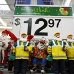 Santa Claus figurines at a New Jersey Walmart in 2007: Across the country, anonymous donors are getting into the holiday spirit by settling strangers' layaway accounts at Walmart and Kmart.