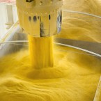 Ground corn in a grain truck at an ethanol production plant: A federal tax credit that encouraged domestic production of ethanol ended as 2012 began.