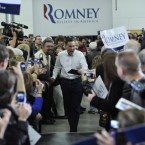 Iowans will finally cast ballots Tuesday in the GOP presidential race, and a strong performance could cement Mitt Romney's status as the inevitable nominee.