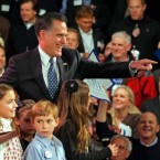 Former Massachusetts Gov. Mitt Romney celebrates in Manchester, N.H., after his big win in the Granite State Tuesday evening.