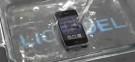 An iPhone 4 gets submerged in water and survives thanks to a thin, water-resistant coating that keeps all the electronics safe.