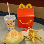 McDonald's is temporarily replacing the little plastic trinkets in British Happy Meals with children's books in an attempt to boost literacy, creativity, and, perhaps, its public image as well.