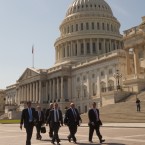 Lobbyists walk past the U.S. Capital last year: Nearly 700 congressional staffers owe a combined $10.6 million in unpaid 2010 taxes.