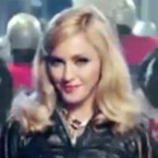 Madonna's football-themed new video for her single "Give Me All Your Luvin'" is exactly the kind of bouncy camp she does best, critics say.