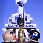 Who has the edge to win the Vince Lombardi Trophy? The New England Patriots may have revenge on their minds, but the Giants have momentum, say pundits.