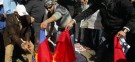 Syrian protesters living in Lebanon burn Chinese and Russian flags in Beirut on Sunday, after the two nations vetoed a U.N. resolution condemning Syrian President Bashar al-Assad's regime.