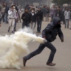 Clashes near the Interior Ministry in Cairo: The U.S. has threatened to cut off $1.5 billion in annual aid to Egypt unless the country's military rulers release 19 arrested Americans.