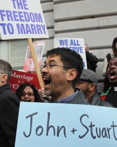 People celebrate outside a San Francisco court Wednesday after a three-judge panel ruled that a voter-approved ban on same-sex marriage violated the civl rights of gays and lesbians.