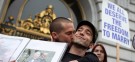 People celebrate in San Francisco Tuesday after a gay-marriage ban is overturned, although the federal appellate ruling may be too narrow to have an effect on any state other than California.