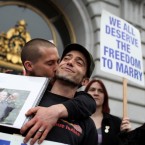 People celebrate in San Francisco Tuesday after a gay-marriage ban is overturned, although the federal appellate ruling may be too narrow to have an effect on any state other than California.