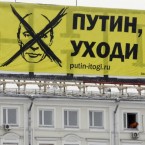 An anti-Putin banner: A growing opposition movement might erupt in a so-called "Russian Spring" if Vladimir Putin regains the presidency.