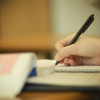 Education pays: In Cincinnati, one high school is rewarding students for just showing up, to the tune of hundreds of dollars a year.