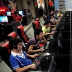 Chinese gamers at an internet cafe: Sen. John Kerry (D-Mass.) says Chinese hackers are illegally stealing business secrets from American firms.
