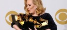 Adele cradles her six Grammys: The British singer has sold 18 million copies of her phenomenally successful album "21" around the world to date.