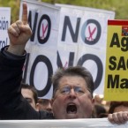 Protesters demonstrate against spending cuts in Madrid: Spain's economy, the EU's fourth largest, is in increasingly dire straits.