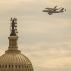 The Discovery space shuttle hitches a ride aboard a 747 airplane to its final home at the Smithsonian National Air and Space Museum in Washington, D.C.