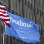 A flag announcing the IPO of Facebook flies outside the JPMorgan office in New York City: GM dropped its paid advertisements from the social media site this week.