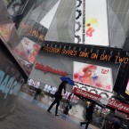A ticker in Times Square spreads news of Facebook's decline: The social network's stock value dropped 10 percent in its second day of trading.