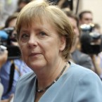 German Chancellor Angela Merkel arrives at an informal EU leaders summit in Brussels Wednesday: Saving Greece and keeping it in the EU may all come down to Germany.
