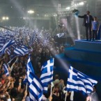 New Democracy party leader Antonis Samaras waves to his supporters last Friday: His pro-austerity party narrowly won Greece's election Sunday.