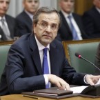 Newly appointed Greek Prime Minister Antonis Samaras attends the first cabinet meeting of the country's new government, which is expected to ask Europe to ease up on harsh austerity demands.
