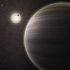 An artist's rendition of the newly discovered planet named PH1, seen in the foreground. The planet is 3,200 light-years away from Earth.
