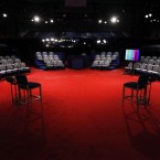 An empty stage awaits President Obama and Republican presidential candidate Mitt Romney in Hempstead, New York. They will take questions in a town hall format