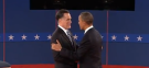 Mitt Romney and President Obama shake hands before their second debate.
