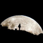 A person is silhouetted against the rising super moon in New Zealand on May 6: Some 4.5 billion years ago the moon and the Earth might have been one.