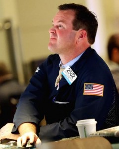 Traders work on the floor of the New York Stock Exchange on Oct. 23: Dow companies are being dragged down by slowing economic growth in China.&nbsp;